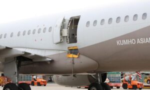 A passenger on an Asiana Airlines trip to South Korea was detained for unlocking the jet door.