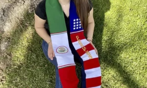 Teenager from Colorado disobeys school rules by attending graduation with a sash that features the US and Mexican flags.