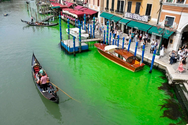 Venice specialists research after waterway turns fluorescent green