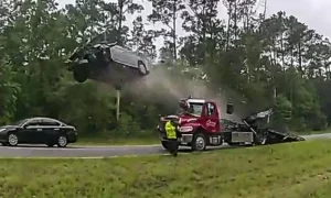 Vehicle goes airborne off tow truck slope on Georgia highway (video)