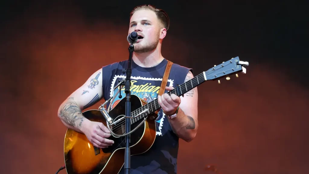 Down home music star Zach Bryan issues cautioning to fans in the wake of removing lady from his show