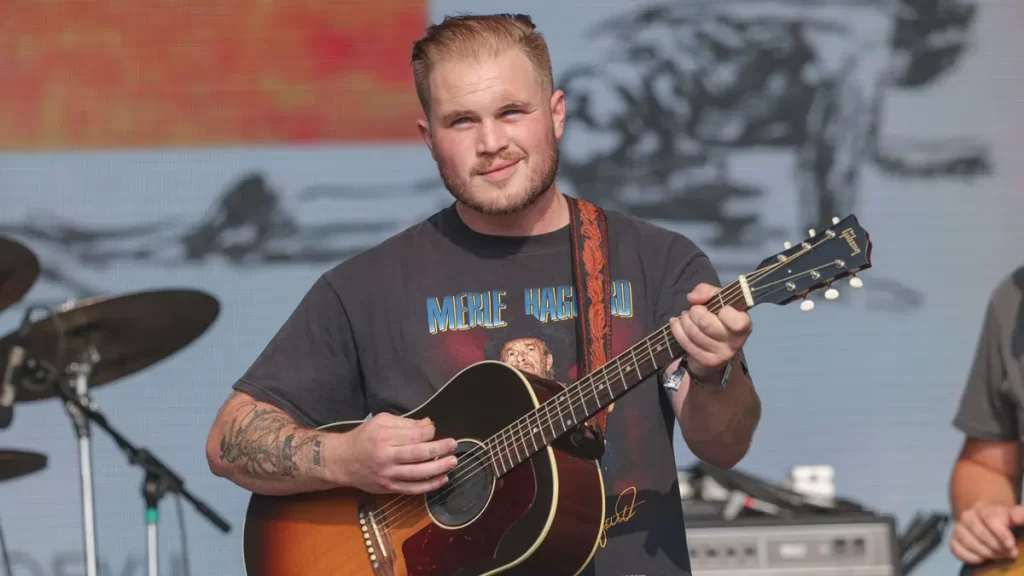 Down home music star Zach Bryan issues cautioning to fans in the wake of removing lady from his show
